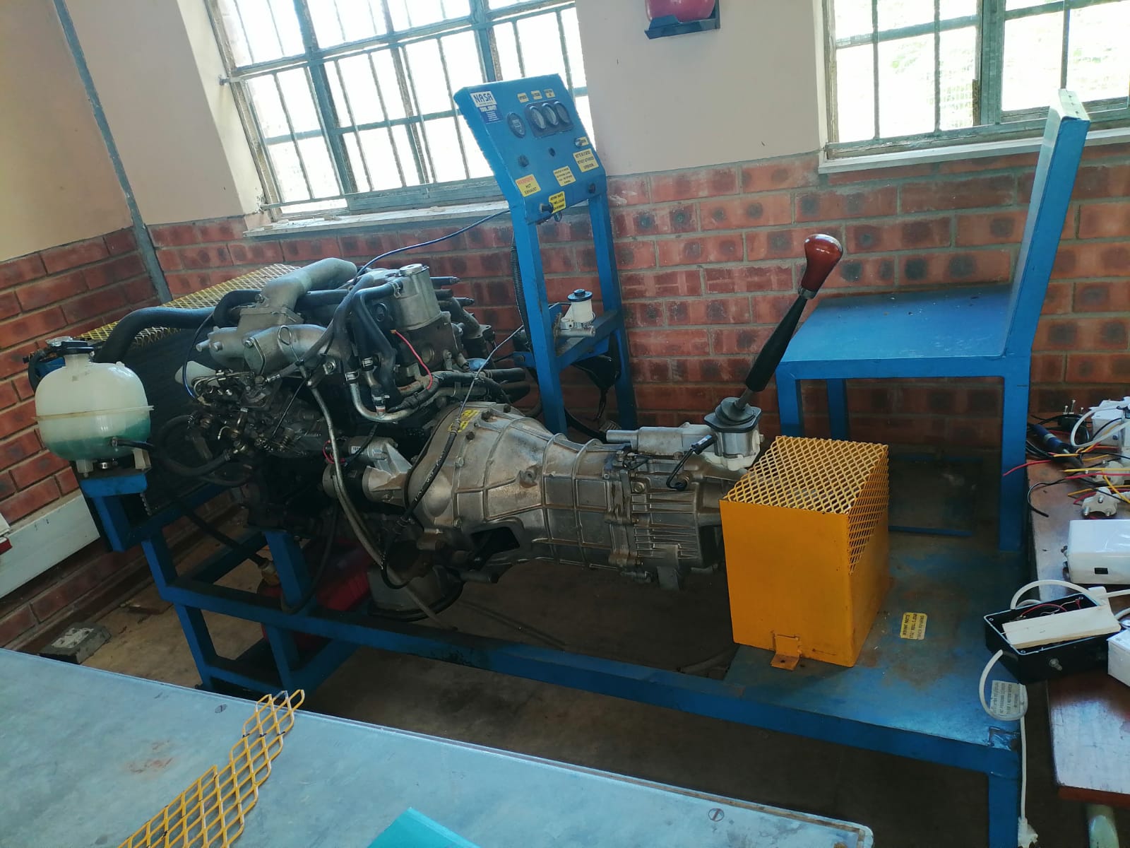 Engine and gearbox assembly on blue test bench
