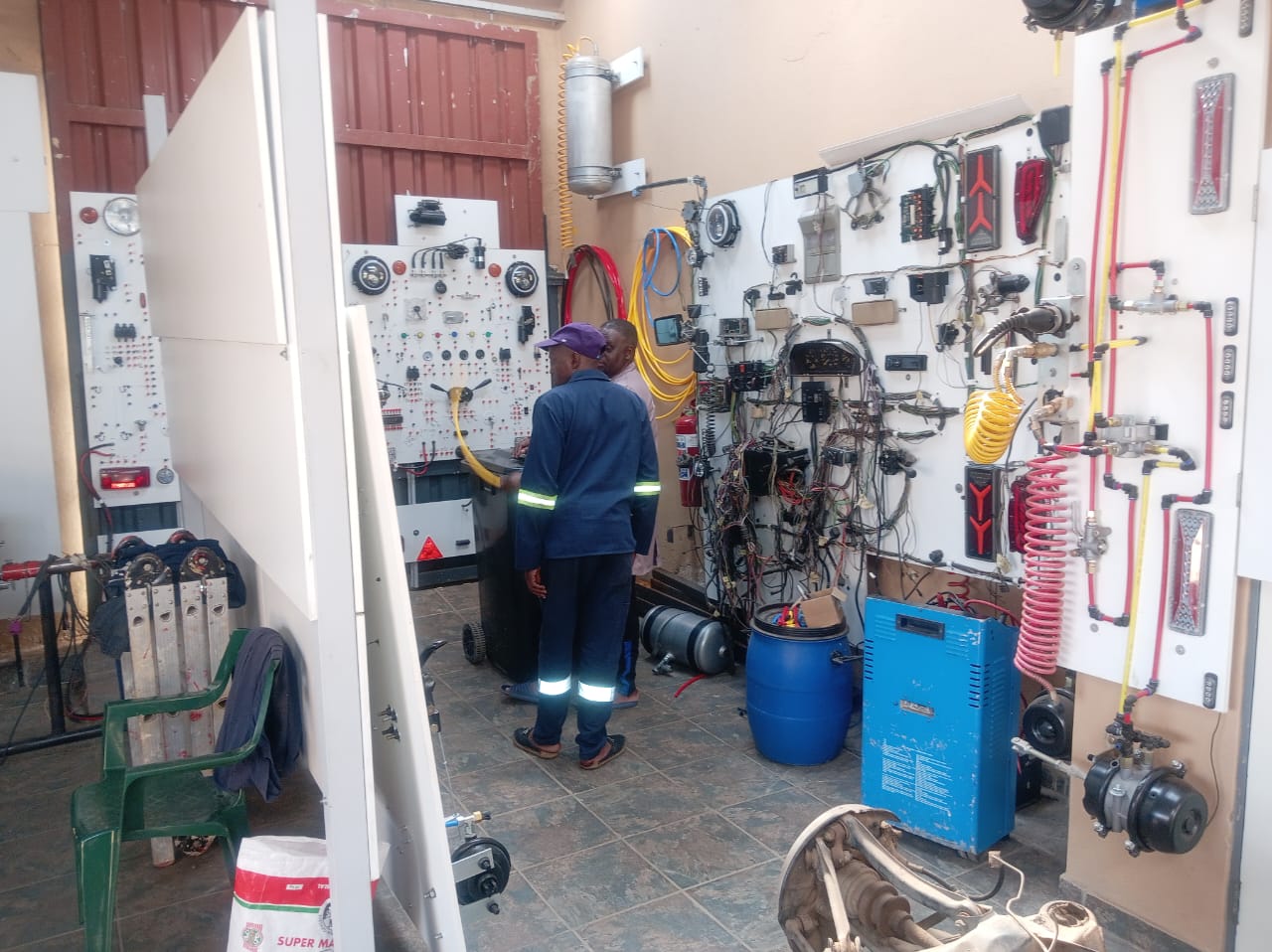 Artisans in automotive electrical and wiring lab